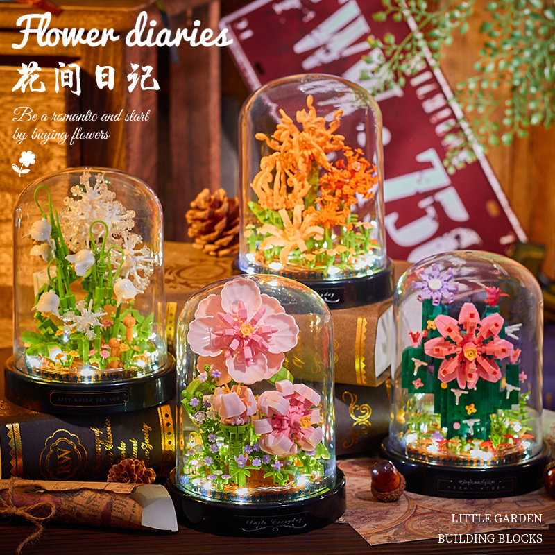 積み木の花がバラのオルゴールを飾っています。|undefined