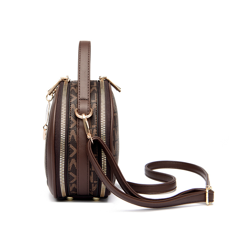 La nueva bolsa redonda impresa a mano de primavera 2023 tiene una piel suave de 98.501 hombros.