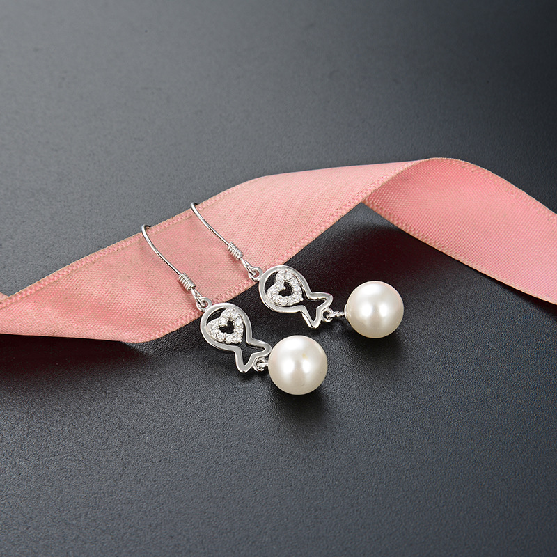 Comercio exterior diseño creativo joyería oído gancho Corea del Sur s925 pendientes de perlas de plata pendientes elegantes de las mujeres al por mayor