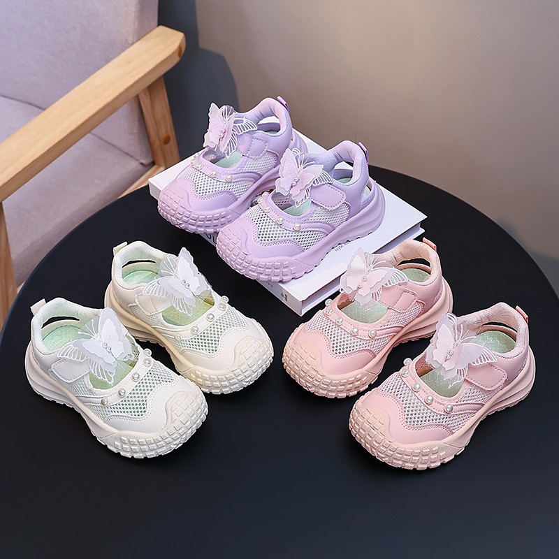 Niñas sandalias deportivas agujeradas 2026 verano nuevos zapatos casuales transpirables de malla para niños zapatos de mariposa perla princesa