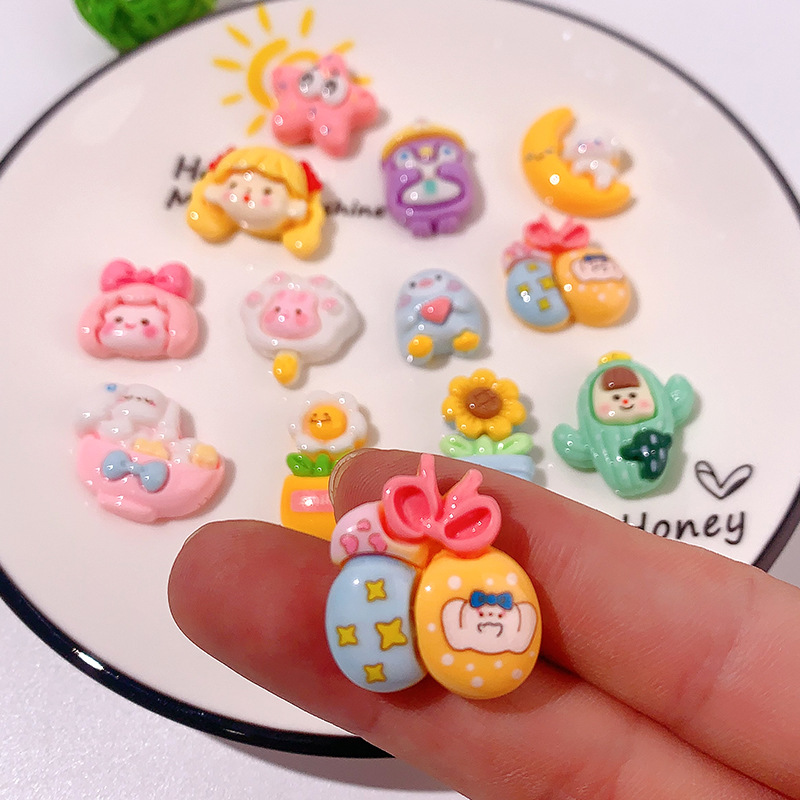 Nuevos accesorios de resina de serie de dibujos animados Happy Dog DIY decoración de cabello pegamento crema agujero de caja de teléfono móvil agujero material de colgante de hebilla