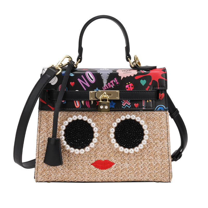 Europa y los Estados Unidos de alto nivel sensación de tela de paja características de diseño bolsas de graffiti de escritorio de diamantes para mujeres colisión de color bolsa de aceite cerradura 1993 #