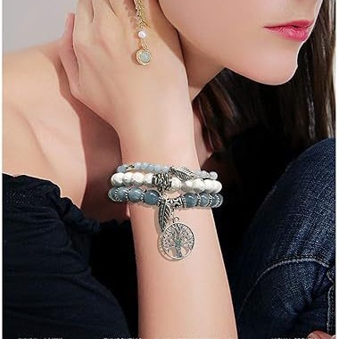 Bracelet bohème pour femme avec pendentif en forme de plume et arbre de vie, orné de perles turquoise._voghion.com