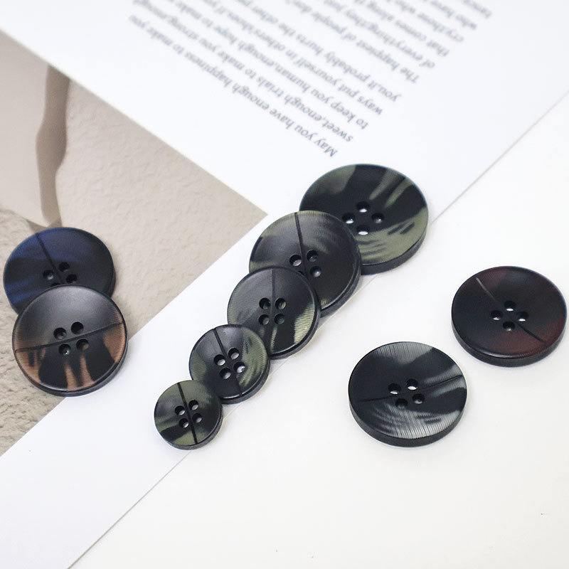Four-eye button black button high-end fashion suit buckle coat windbreaker button high-end women's woolen coat button Four-eye button black button high-end fashion suit buckle coat windbreaker button high-end women's woolen coat button
