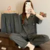 Трёхпредметный комплект кардиган, Чёрные вертикальные полосы