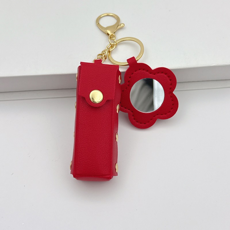 Flor espejo llavero cuero transfronterizo regalo colgante joyería creativo mini lápiz labial almacenamiento llavero colgante