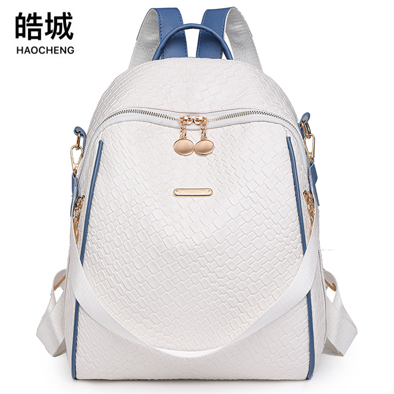 2024 verano nueva moda contraste color damas mochila simple tejido multifuncional mochila de viaje de doble uso al por mayor