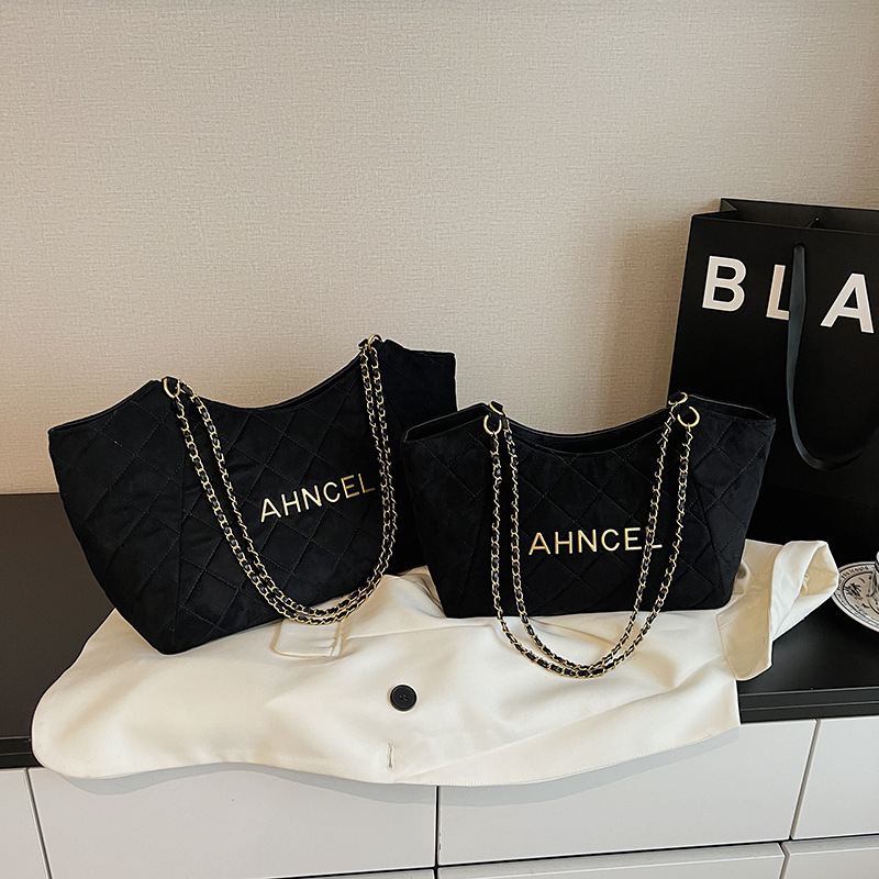 Bolsa de cadena de diamante transfronteriza bolsa de gran capacidad bolsa tote para mujeres otoño y invierno 2025 nueva bolsa de hombro de viaje de mano bolsa de brazo