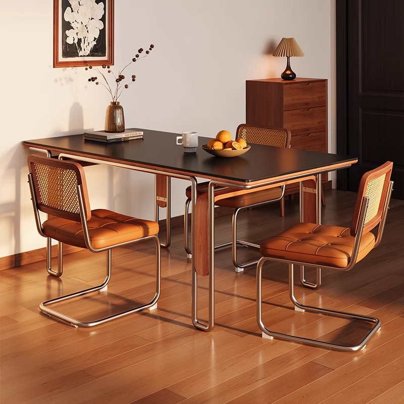 Mesa de comedor de madera maciza de tablero de roca Bauhaus de estilo medio 2025 nuevo estilo rectángulo negro de alta gama para el hogar pequeño apartamento