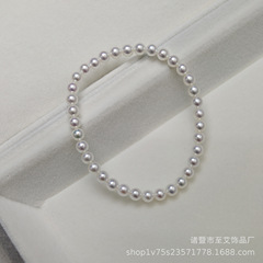 Zhuji 4-5mm 淡水パールブレスレット弾性ロープオーロララウンドほぼ完璧なミレットビーズリングブレスレット