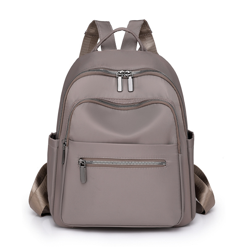 Transfronterizo al por mayor 2023 nueva mochila de nailon para mujer coreana simple y versátil mochila de viaje anti-salpicaduras de agua mochila escolar