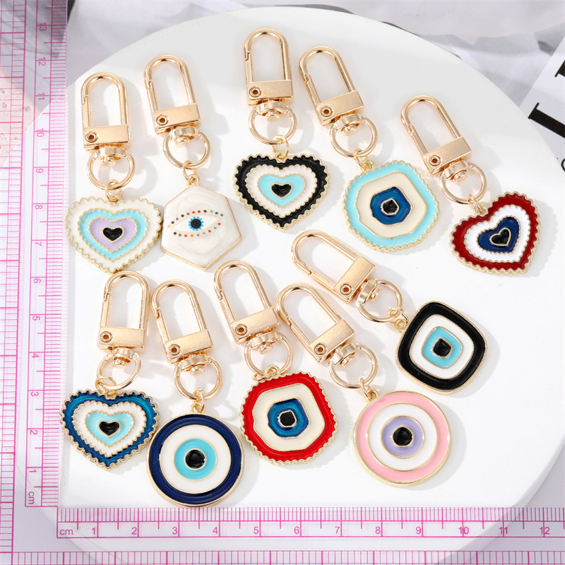 Simple Colorful Eyes Heart Keychain Alloy Irregular Round Bag Pendant Accessories display picture 1