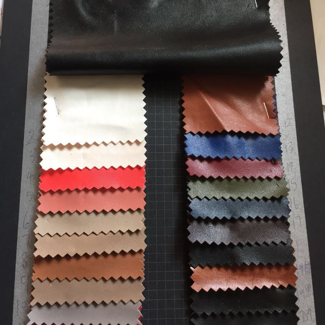 1688纳帕纹半PU纬边拉毛底弹力面料手袋服装包装玩具锁边包边面料