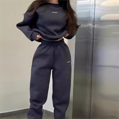 国境を越えた秋のアマゾン欧米の女装の純色のカジュアルなファッションのズボンは長袖の帽子のセーターのスーツの女性を厚くします。