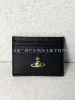 Black cross pattern card holder