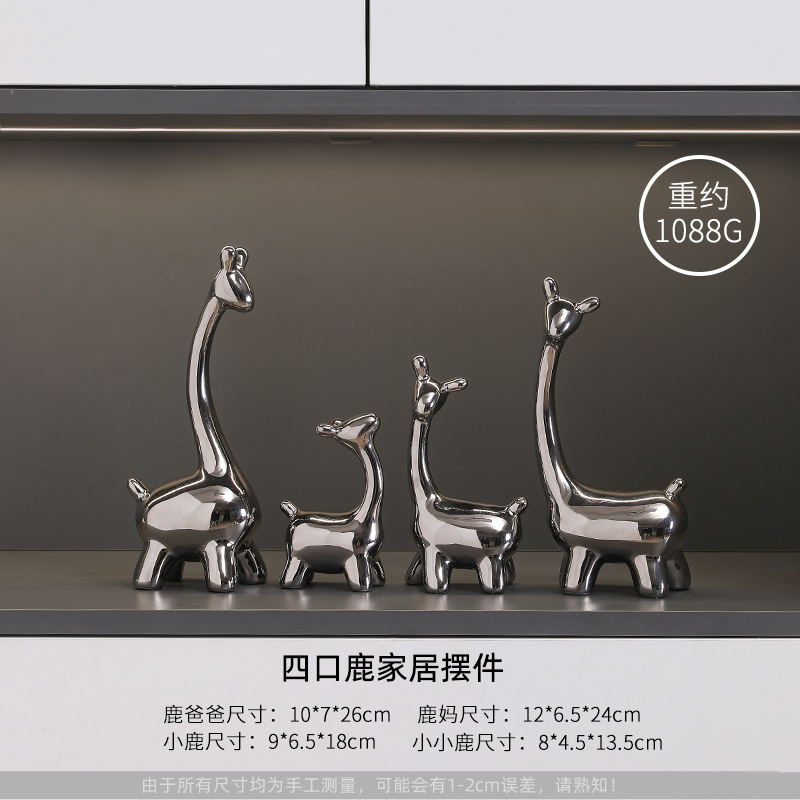 사슴 장식품을 가진 4인 가족