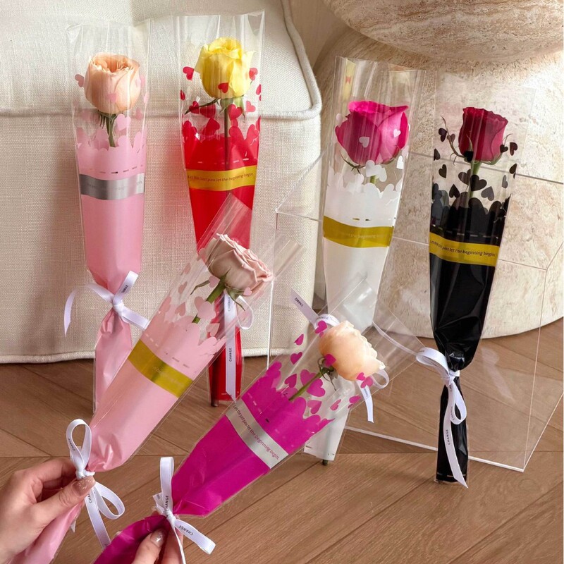 Instagram-style love flower single-stem bag, bright colors, bouquet packaging bag, specialized for flower packaging Instagram-style love flower single-stem bag, bright colors, bouquet packaging bag, specialized for flower packaging