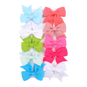 Juego de horquillas con lazo de cola de milano para niños de estilo caliente de Amazon, lindo y versátil, horquilla diaria para niñas europeas y americanas 323