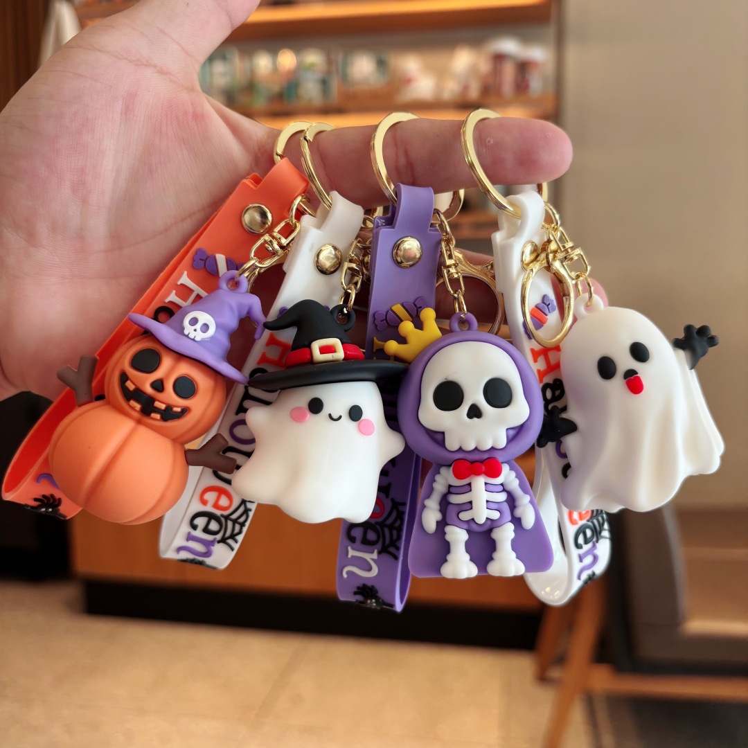 Cross-border bestseller Halloween pumpkin skull keychain pendant, quirky figurine for student bags and keychains