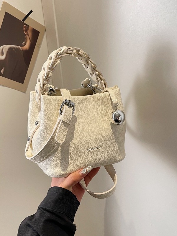 Bolso de mujer 2026 verano nuevo tejido a mano bolso de cubo de moda simple bolso de hombro mochila