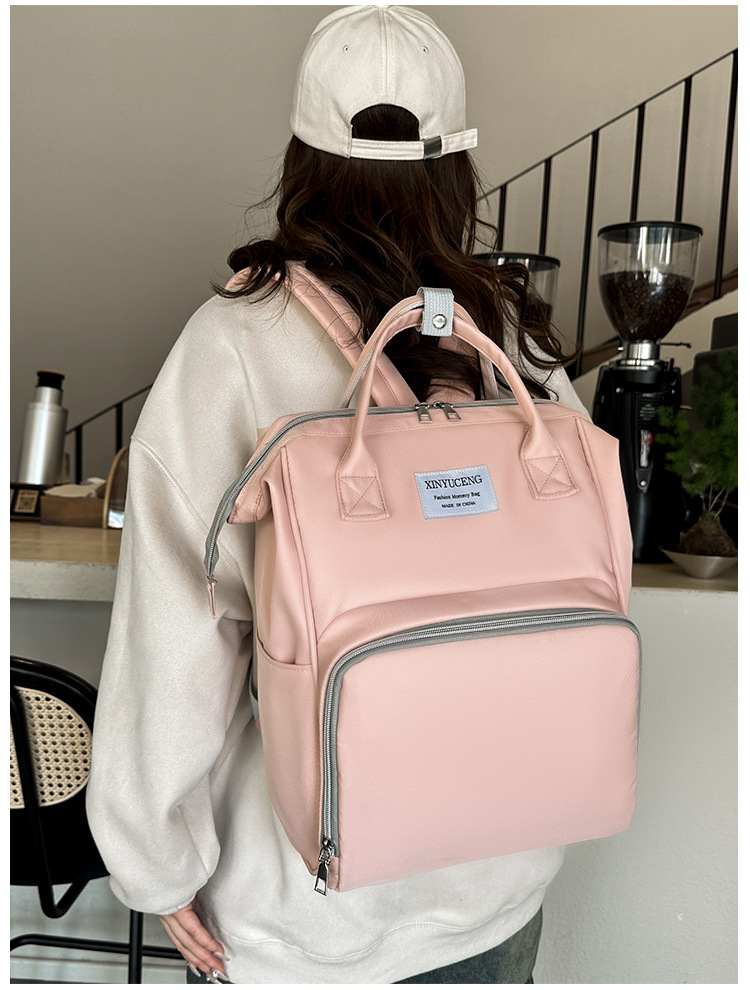 Solid-color lightweight mom bag, a backpack for taking kids out, multi-functional large-capacity mother and baby bag for girls undefined