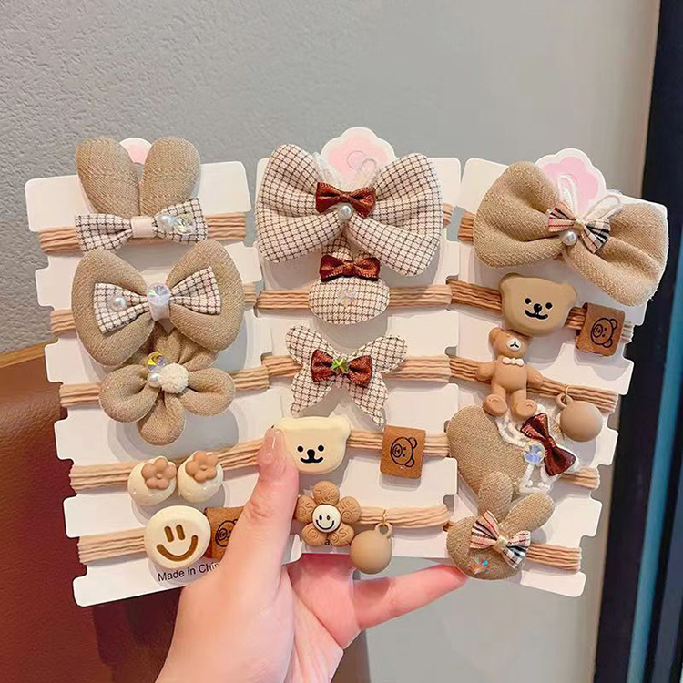 Otoño e invierno leche marrón accesorios para el cabello de las niñas banda de goma banda para el cabello cuerda de pelo de cola de caballo alta cuerda de pelo de los niños banda de goma