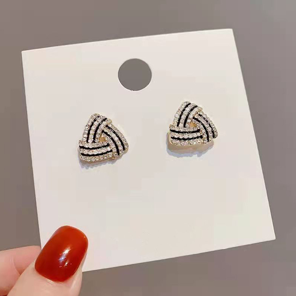 1 Pair Simple Style Shiny Triangle Hollow Out Inlay Copper Zircon Ear Studs display picture 6