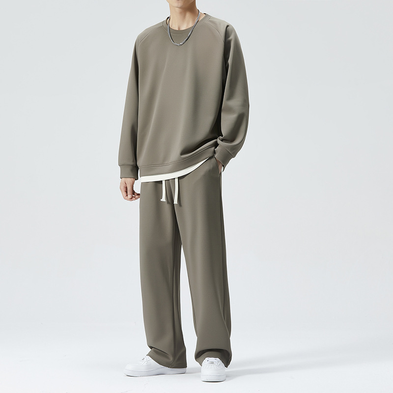 Otoño e invierno traje deportivo casual de los hombres de dos piezas de color sólido cuello redondo falso suéter de dos piezas pantalones de chándal traje de la moda de los hombres