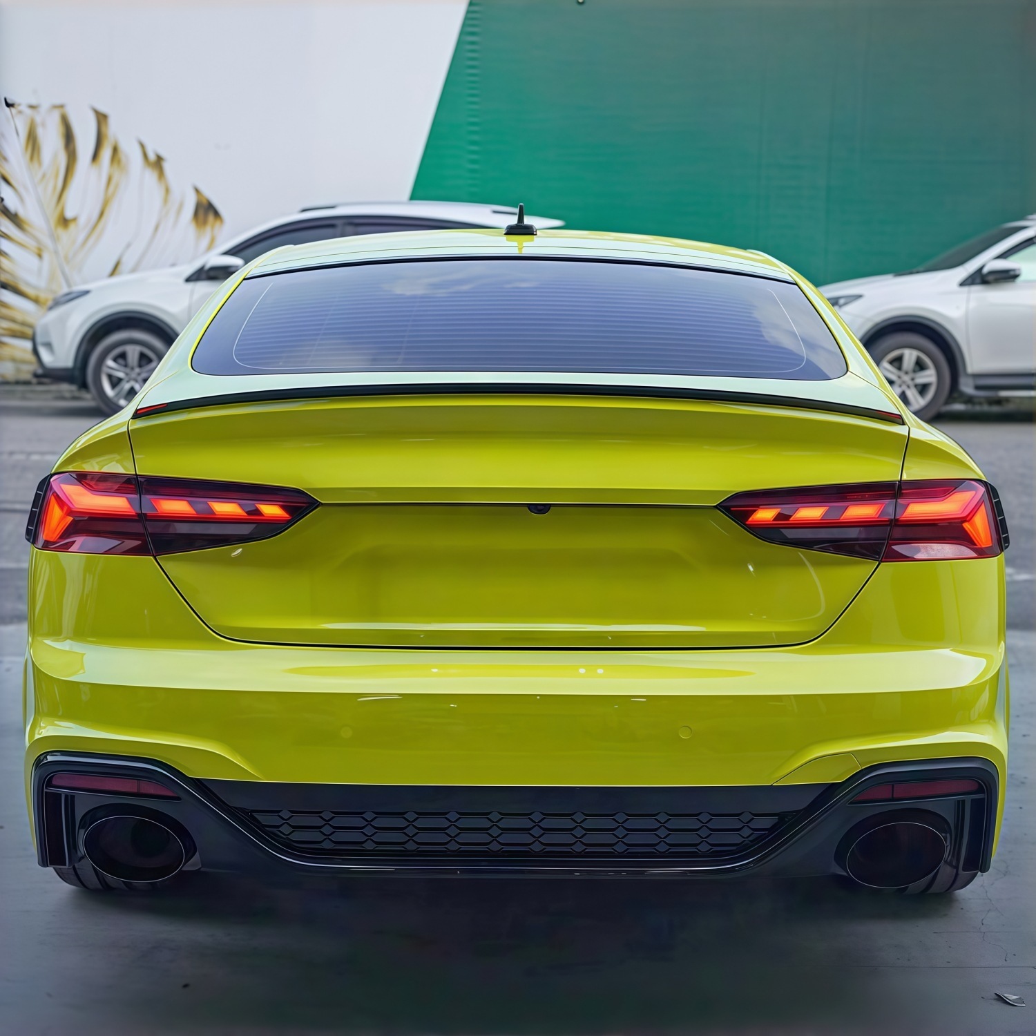 Suitable for Audi A5 2021-2024 models, RS5 rear bumper assembly, rear surround, tail lip, tail throat, and rear lower skirt, in a black finish