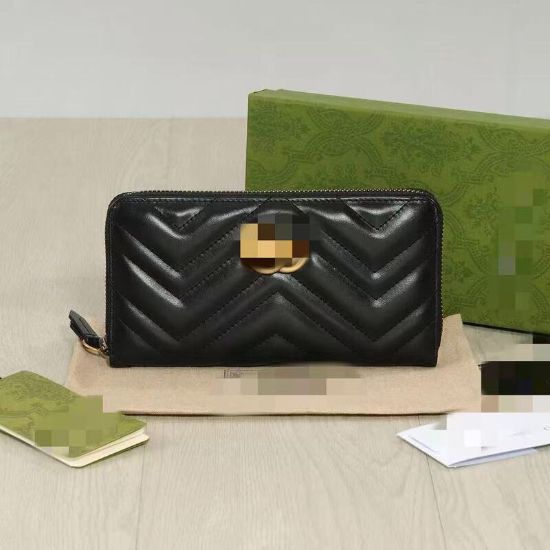 Gucci GG Marmont series single-zipper wallet, made of sheepskin with a unique textured design, offering a classic, minimalist, and fashionable look Gucci GG Marmont series single-zipper wallet, made of sheepskin with a unique textured design, offering a classic, minimalist, and fashionable look