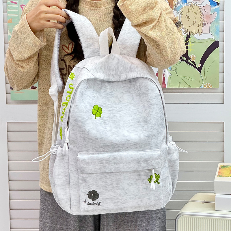 Versatile Japanese-style junior high school student backpack, high school lucky four-leaf clover Korean version, simple new large-capacity student schoolbag