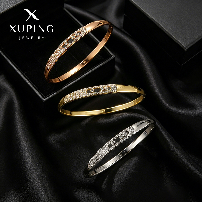Nueva pulsera Xuping de piedras preciosas artificiales, sencilla y elegante, estilo cielo estrellado, accesorio versátil de lujo ligero.