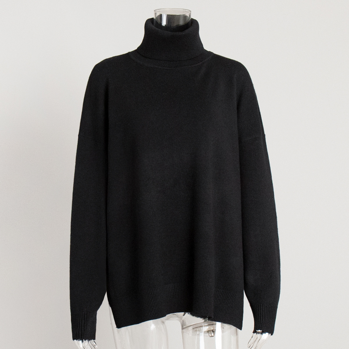 Suéter de cuello alto transfronterizo para mujeres 2025 otoño y invierno nuevo suéter casual estilo europeo y americano bifurcado suéter de punto de color sólido