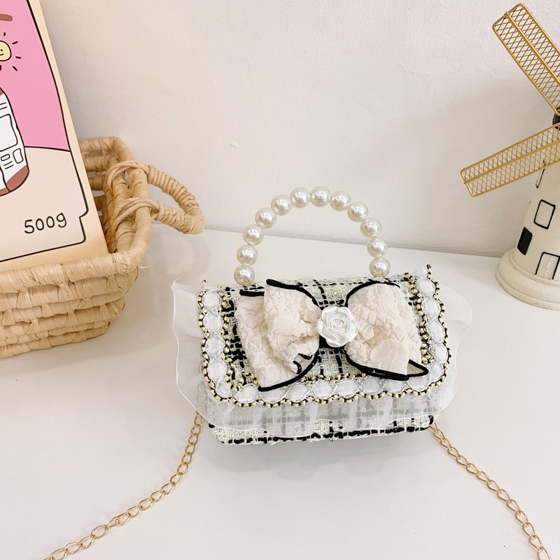 2025 nuevo estilo coreano de viento de fragancia mini niñas princesa de perlas portátil hombro único accesorios bolsos para niñas