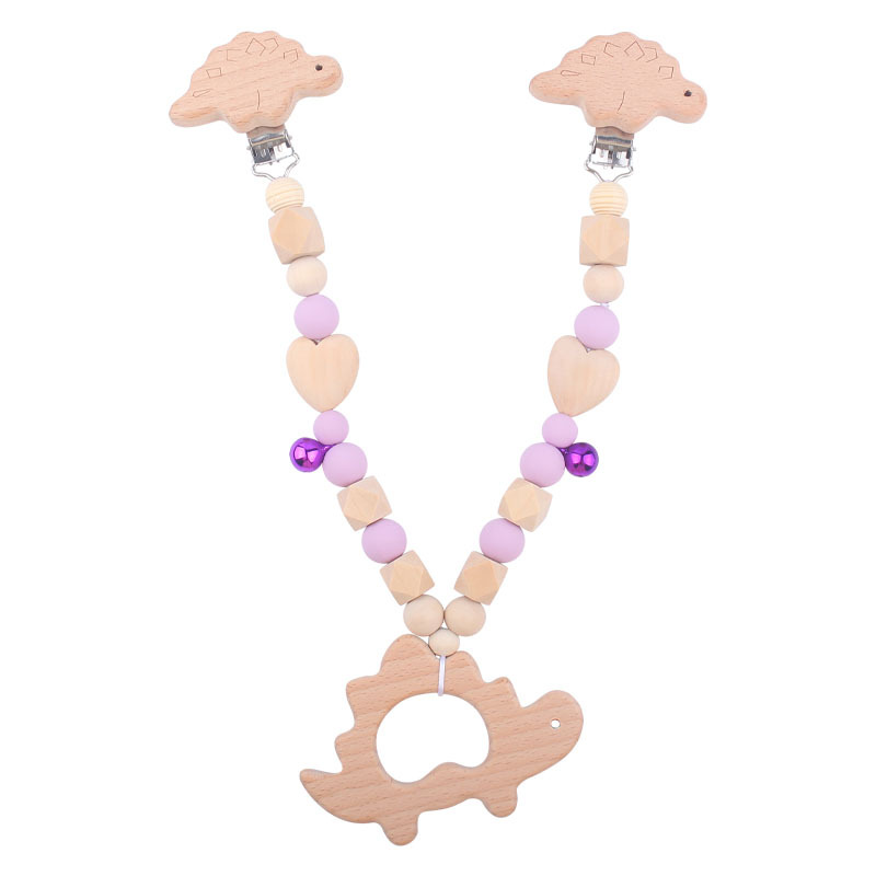 Suministros para bebés pulsera de silicona molar de juguete para niños Cadena de cochecito de dinosaurio de tres piezas creativa pequeña campana colgante