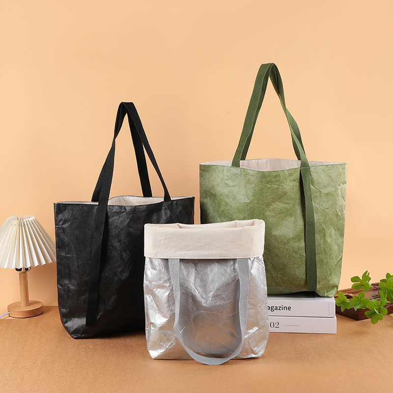 Bolsas de papel DuPont personalizadas logotipo lavable bolsa kraft no desgarrable bolsa de regalo de hombro tote personalizado