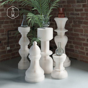 Eighteen paper creative chess display table window decorative column display rack exhibition High and Low Island running water table display rack