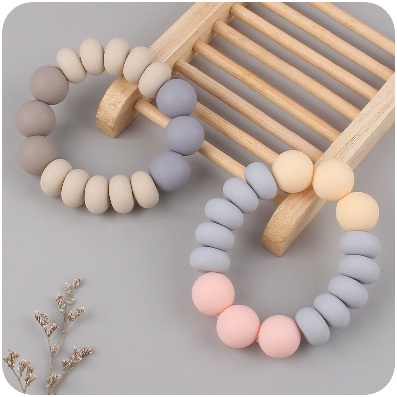Nuevo bebé suministros espaciador cuentas mordedor pulsera bebé creativo Cuentas planas de silicona mordedura molar juguete mordedor