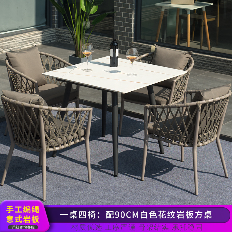 Conjunto de mesa y sillas para exteriores, mesa y sillas de comedor de ratán para patio de villa, conjunto de tres piezas de silla de ratán para balcón nórdico, muebles sencillos, material de ratán.