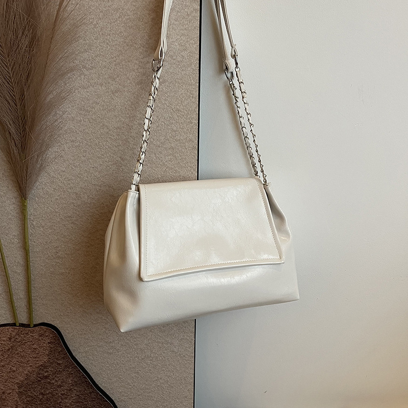 Bolsa de hombro de textura plateada de gran capacidad de transporte de cadena, nuevo nicho de diseño retro bolso de mujer