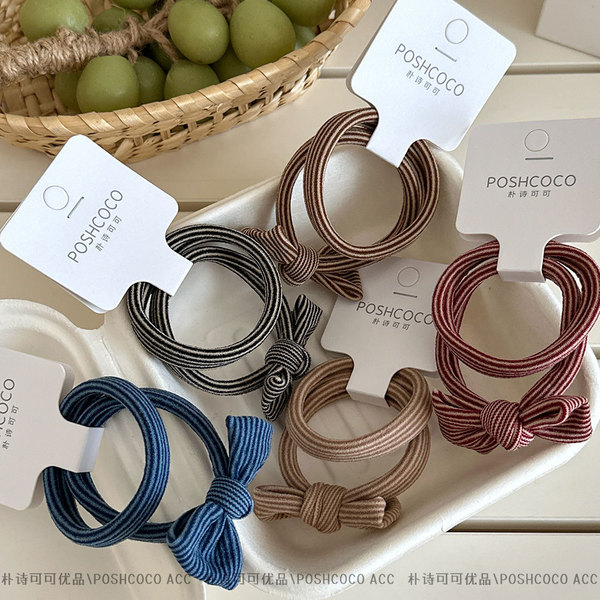 Elastic towel with bow