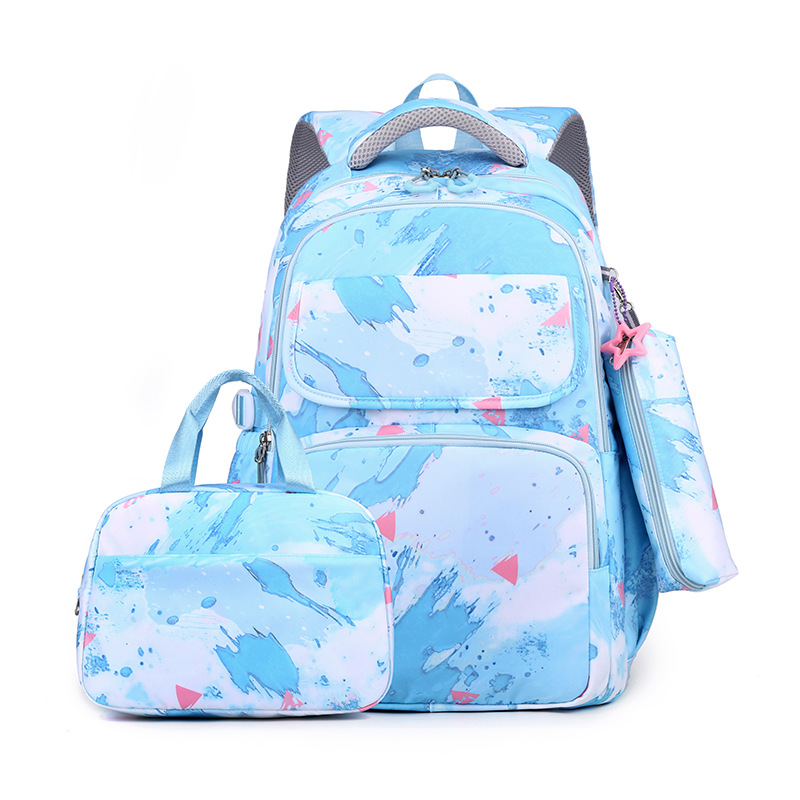 Transfronterizo de tres piezas mochila ultraligero reducción de carga grado 3-6 escuela primaria estudiante mochila niños escuela primaria mochila al por mayor
