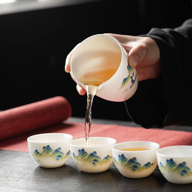 Dehua mutton-fat jade white porcelain set kung fu tea set travel tea set wholesale gift box high-end covered bowl tea cup with logo