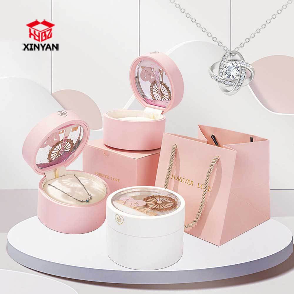 Caja de regalo creativa del día de San Valentín Qixi collar pulsera anillo de arena flotante luminosa LED caja de joyas de rueda gigante