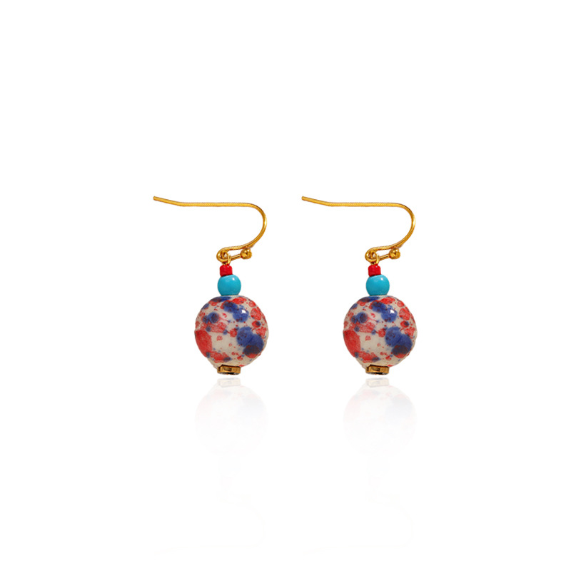 Europa y los Estados Unidos más vendidos antiguos aretes de cerámica azul y flor serie de aretes de cerámica nuevos aretes de estilo chino diseño temperamento estilo anillo redondo