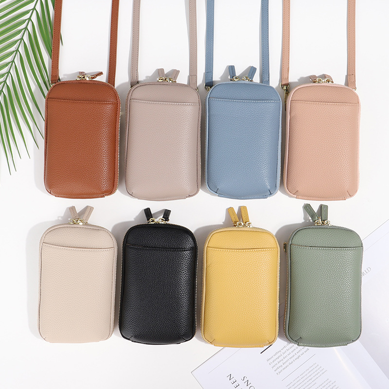 Guangzhou nuevo simple crossbody bolso del teléfono móvil de las mujeres de moda bolso de hombro ligero versátil vertical león cresta pequeña bolsa de fábrica