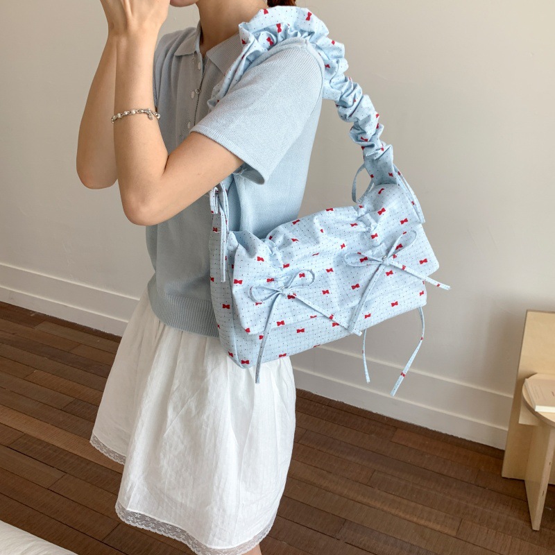 Bolso de moda coreano 2025 verano nuevo bolso femenino lindo lazo bolso de hombro fresco plisado bolso de mensajero