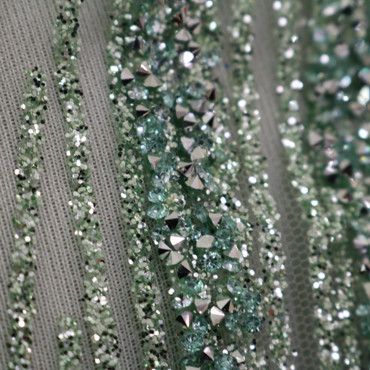 2024 nuevo tejido de malla de malla de malla tridimensional encaje rociado oro diamante vestido de boda tela al por mayor
