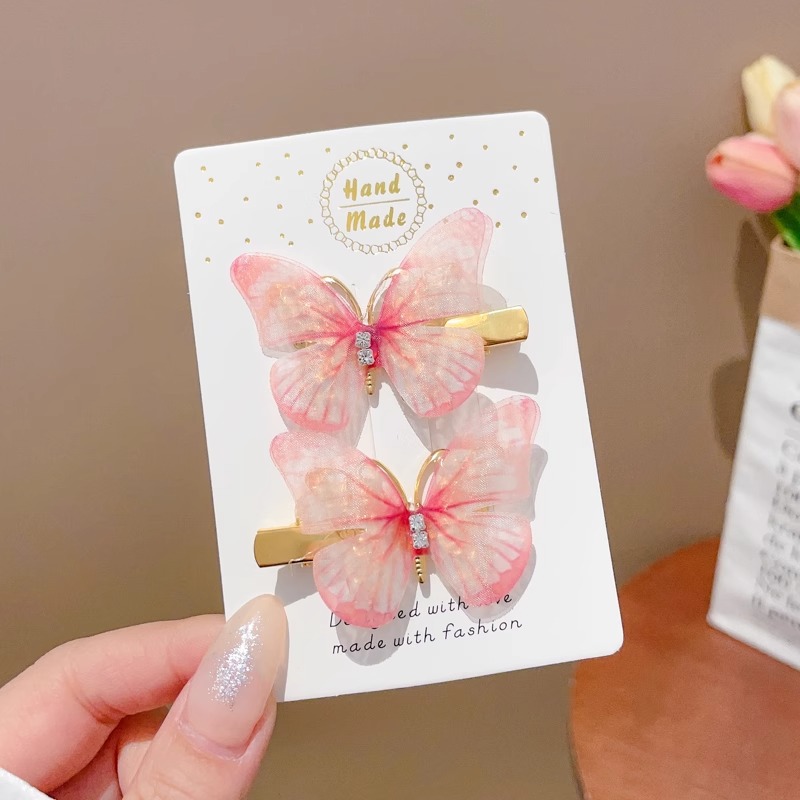 Clip de cabello de mariposa móvil ultra inmortal electrónica azul tulle perla clip de boca de pato decoración accesorios de playa clip tocado