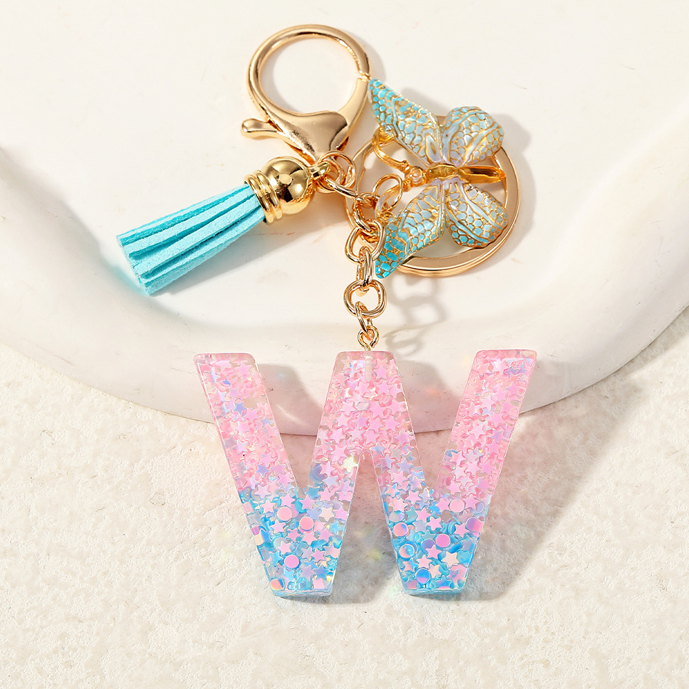 Europa y los Estados Unidos transfronterizos nuevos cristal sequinado goteo de goma letras inglesas joyería llavero y bolsos colgante apoyo al por mayor